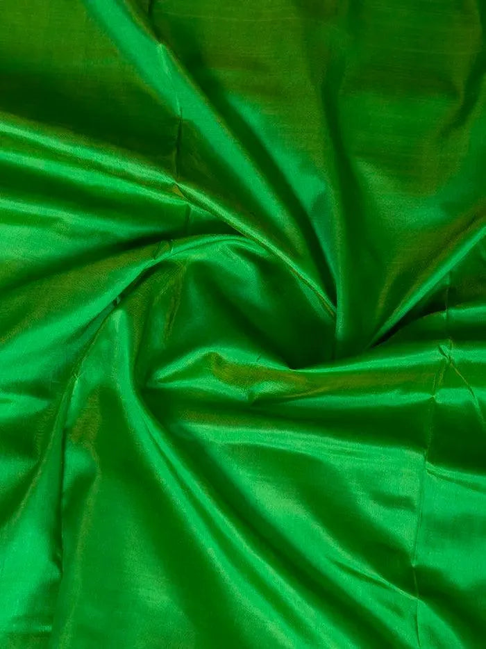 Green Straw Duel Tone Handwoven Katan Silk Fabric - WeaversIndia